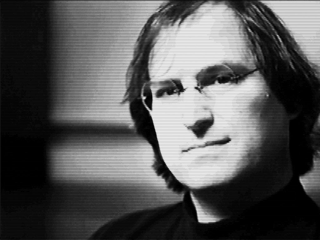 SteveJobs_Still_MED Black and white photo of Steve Jobs